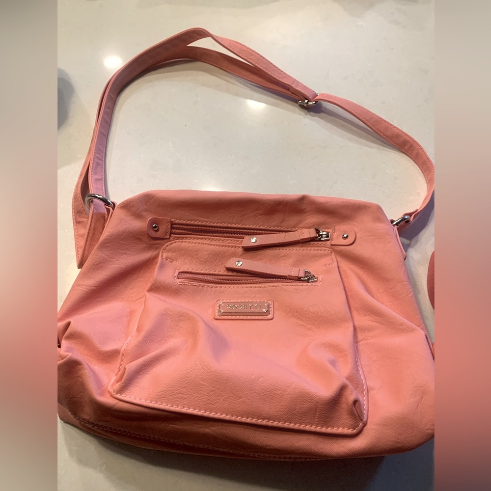 Rosetti like new light coral/peach purse